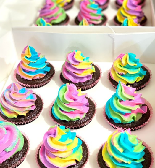 Multicoloured Buttercream Frosting on Top Cupcake